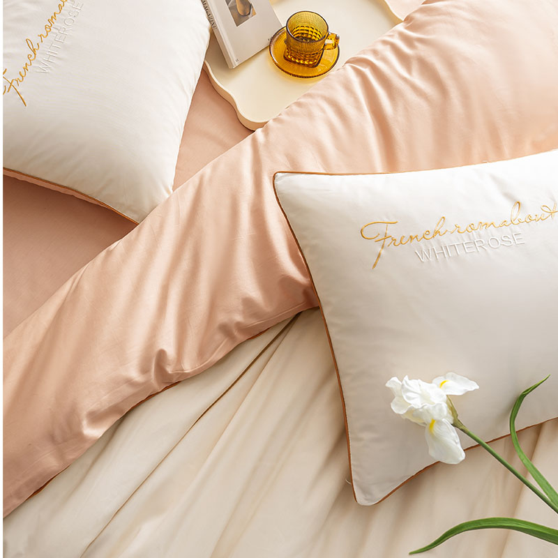 Set tempat tidur kapas murni sederhana dan murah hati yang diwarnai